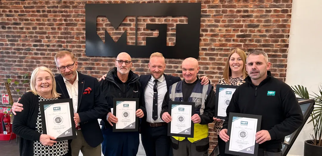 Cropped for Header | Made For Trade Long Service Awards. From left to right Brenda Webster, Richard Gaunt, Kevin Southall, Bradley Gaunt, Frank Donaghy, Amy Pout and Richie Bezance.