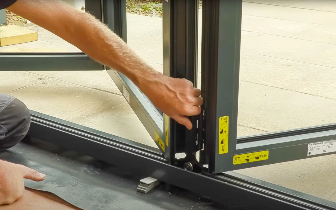 Skill Builder installing a Korniche Sliding Door System on a patio.